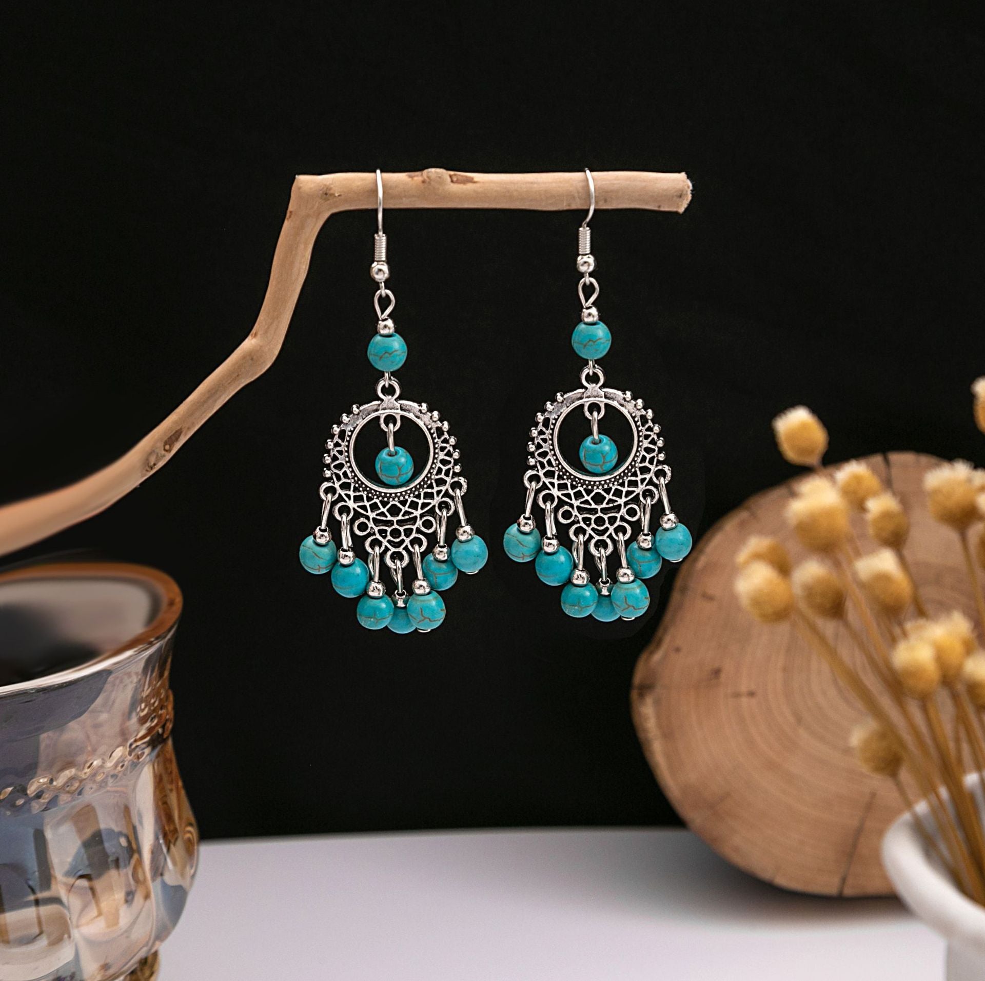 Wholesale Hollow Circular Flower Tassel Alloy Earrings